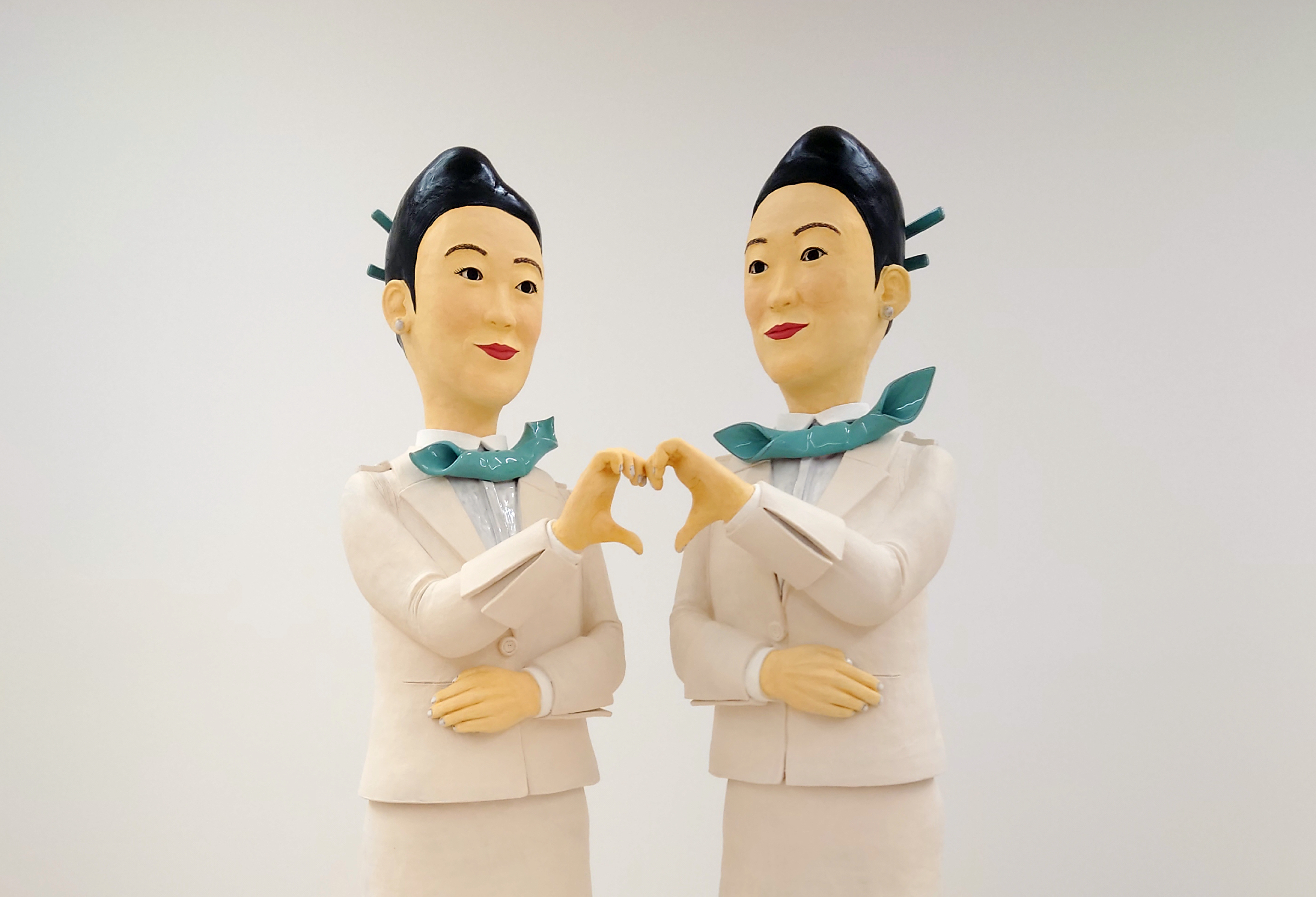 Behind a Flight Attendant’s Painted-On Smile