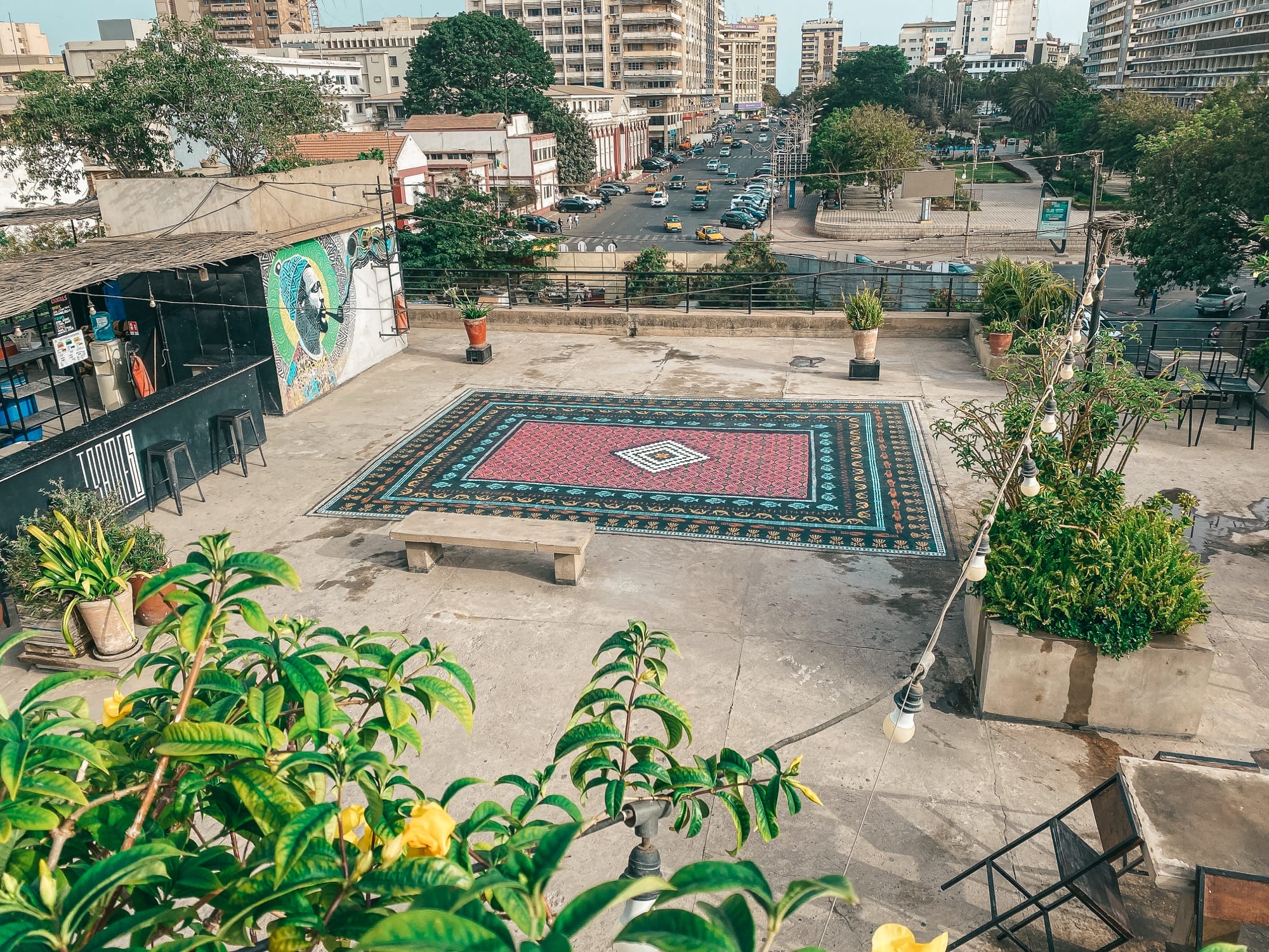 An Ornate Stenciled Rug by Mateo Complements a Cultural Center’s Communal Rooftop in Dakar — Colossal