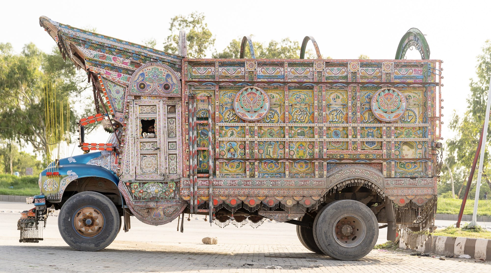 Christopher Herwig Motors Through Southeast Asia to Capture a Vivid Fleet of ‘Trucks and Tuks’ — Colossal